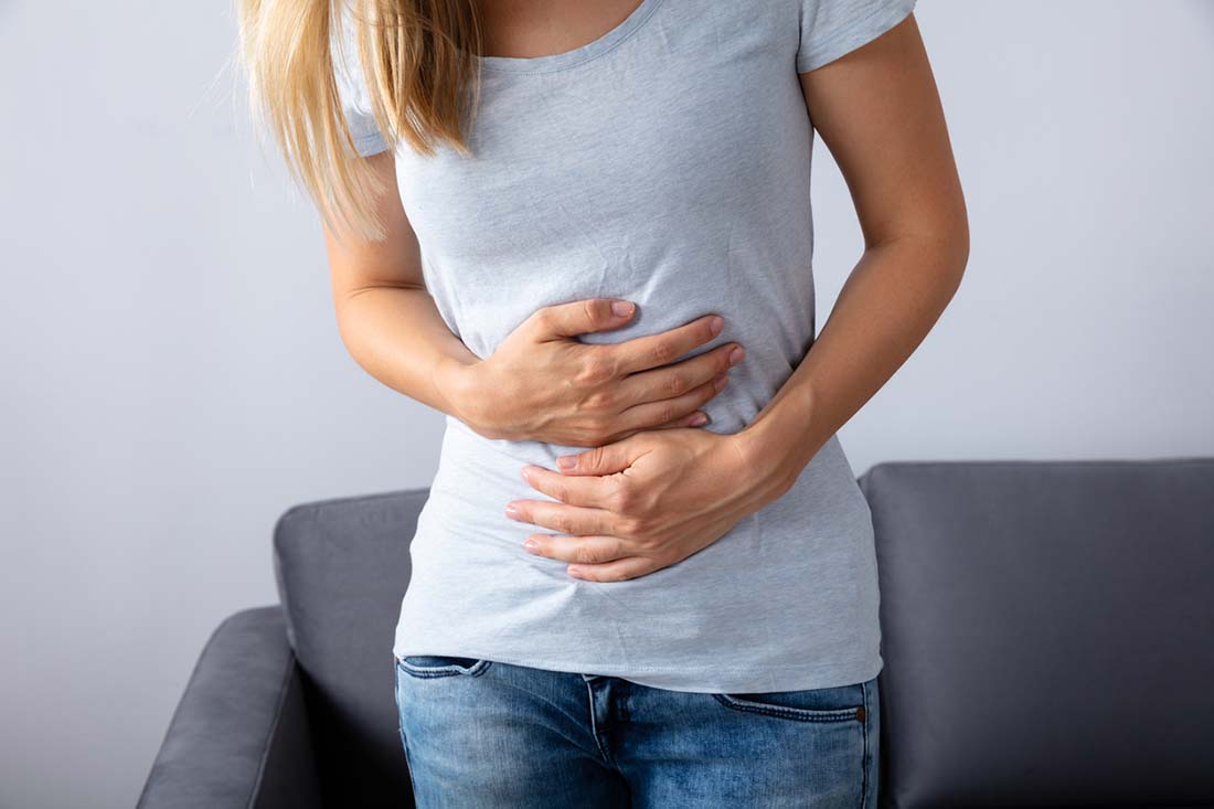 Woman Suffering From Stomach Pain